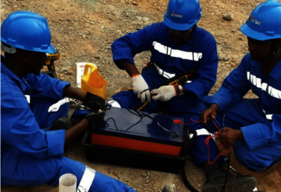 Men working on a battery
